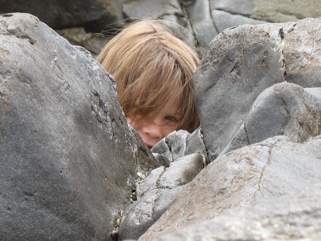 kid on the rocks